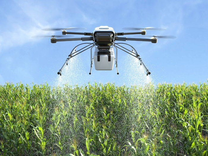 Agricultural drone flying over a field